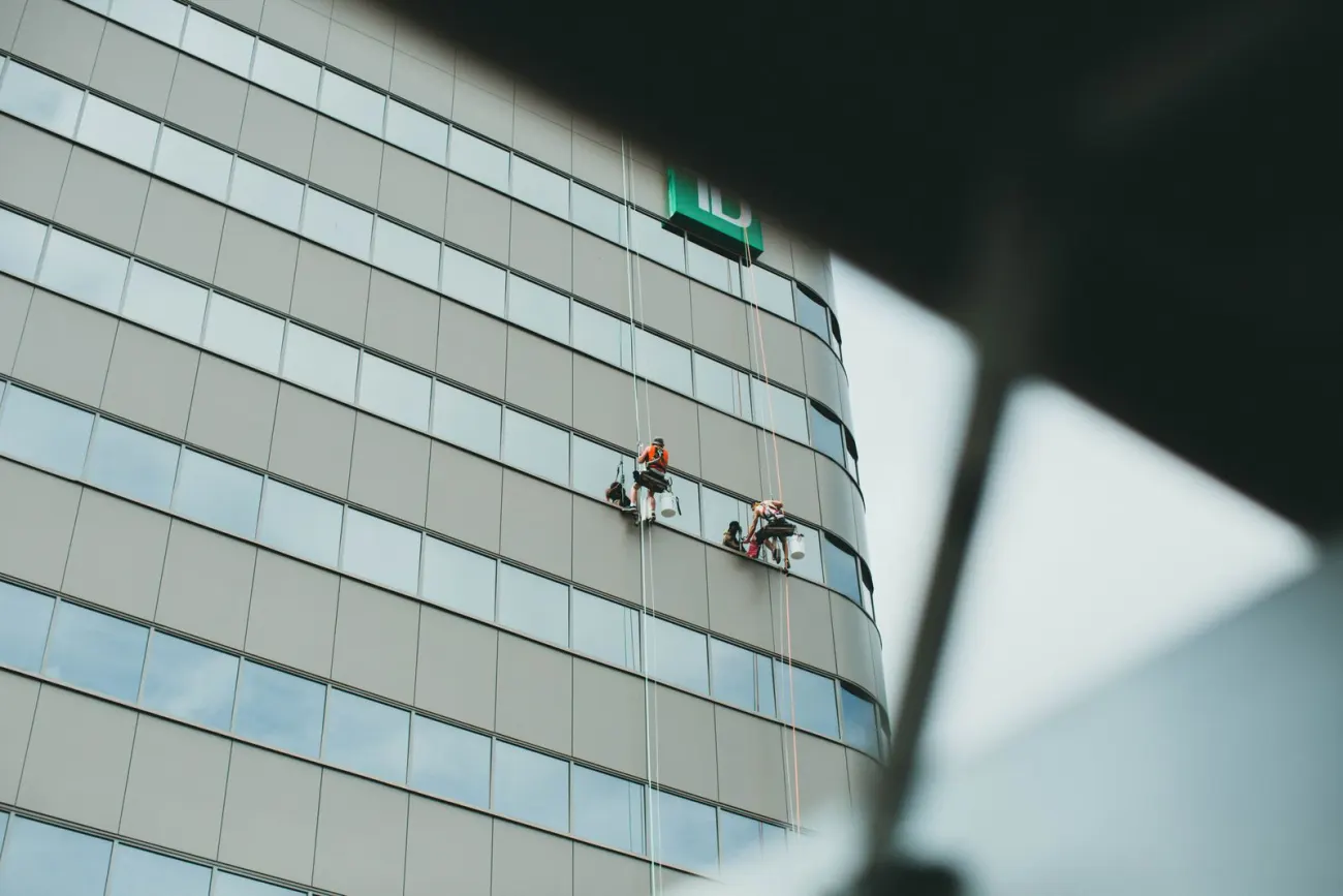 Cleaning crew working outside a commercial building
